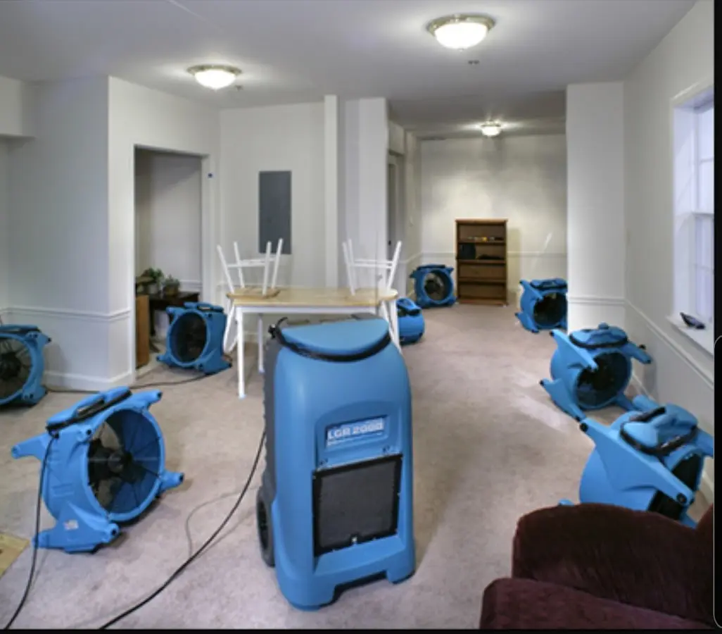 Air movers and dehumidifier setup for Water Damage Restoration in Walkersville